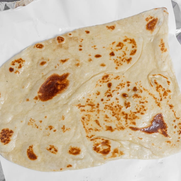 Indulge in Our Butter Naan